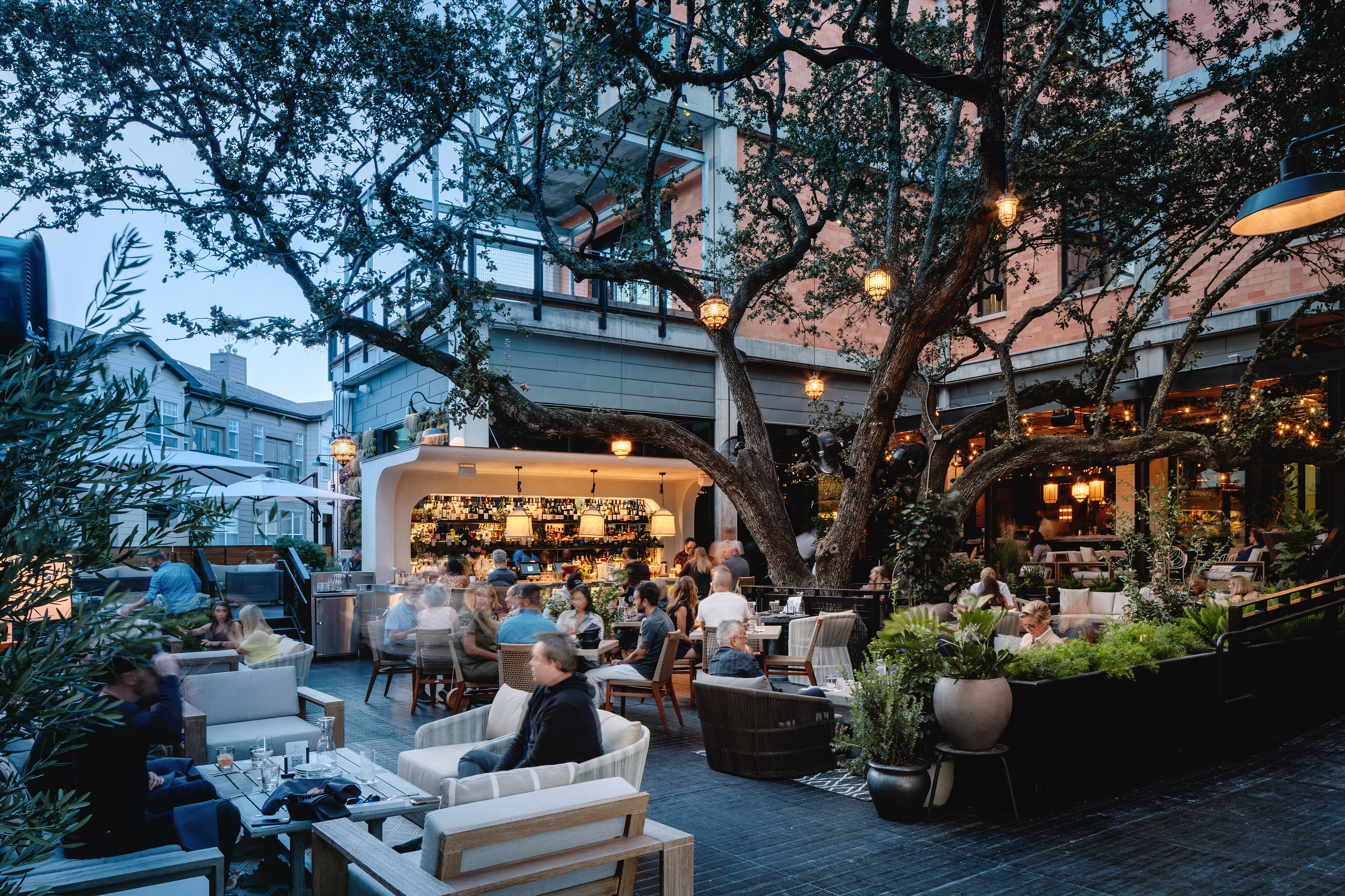 Aba Austin exterior at dusk — hospitality design by Avril Zayas